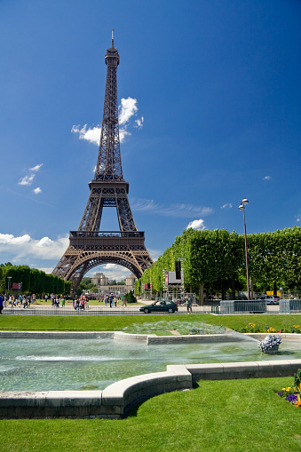 aerial shot of Trocadero, Jardins du Trocadero, Palais de Chaillot in Paris. The business district of La Defense, sits in the background just outside of Paris proper.