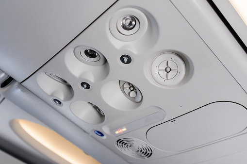 Overhead lights and ventilation on board a Boeing 737-800 aircraft