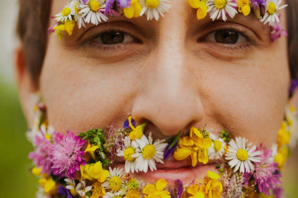 istock Amid woods, floral-faced man seeks inner serenity 1727485124