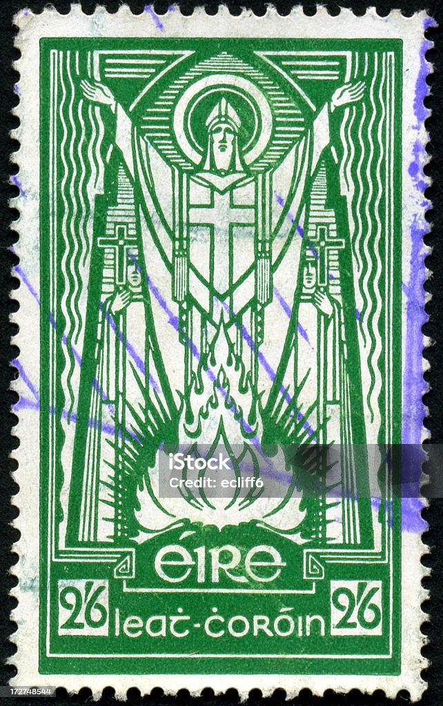 St. Patrick Stamp An Irish postage stamp issued in 1943 depicting St. Patrick and Paschal Fire. Celebration Event Stock Photo