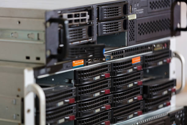 E-waste concept and management reuse recycle and recovery. Old servers in warehouse are ready for recycling. No people.