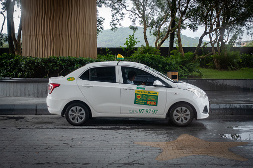 Toyota yellow taxi cab in Taipei, Taiwan. Taipei is the capital city of Taiwan with population of 8.5 million in its urban area.