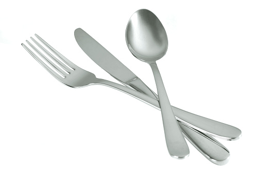 Knife fork and spoon isolated on white