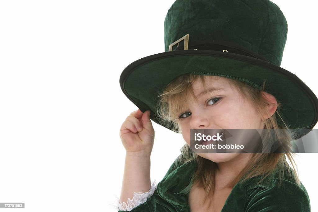 Smiling Leprechaun Portrait of a little girl Leprechaun tipping her hat.  Celebration Event Stock Photo