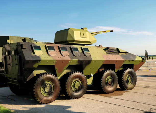 istock Military camouflage armored vehicle on concrete 1727520492