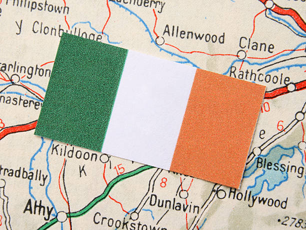 Irish paper flag over more than fifty years old map
