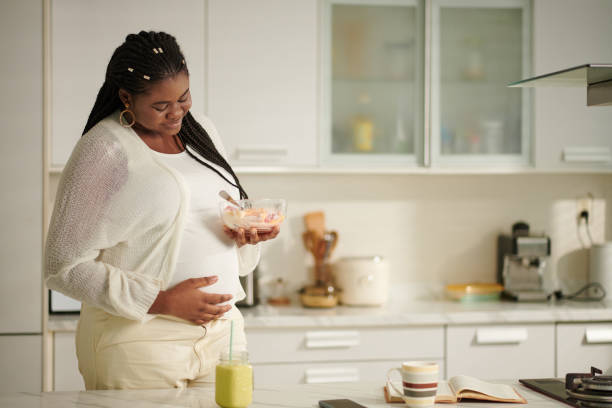Pregnant Woman Eating Healthy Breakfast