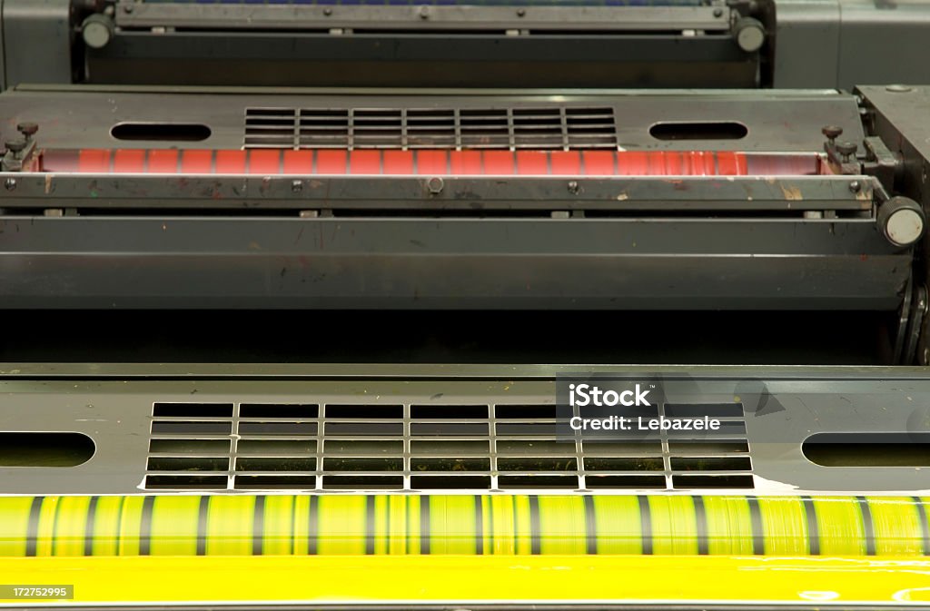 Printing Machine Huge, German made printing machine. Yellow and Magenta units. Abstract Stock Photo