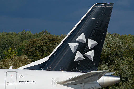LOT Polish Airlines Embraer E175 in Star Alliance livery vertical stabilizer (tail) close-up photo