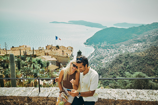 Young adult couple enjoying their vacation in the south of France on the beautiful Côte d'Azur.