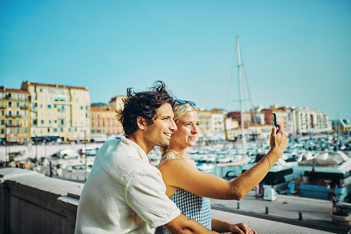 Young adult couple enjoying their vacation in the south of France on the beautiful Côte d'Azur.