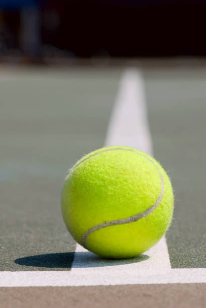istock Tennis Ball On The Line 172754481