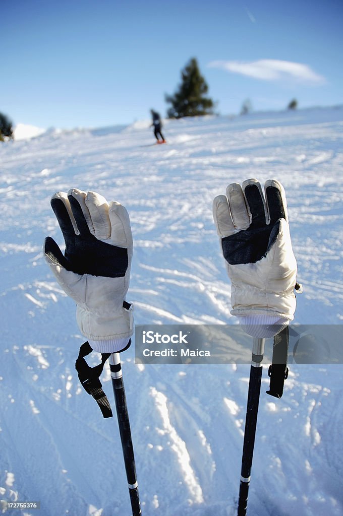 Ski Ski gloves on poles.Snow Holidays Lightbox Alpine Skiing Stock Photo
