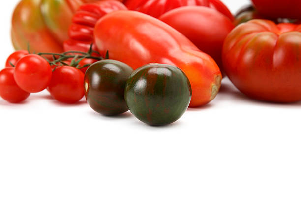 выбор помидоры - green tomato black krim tomato cherry tomato tomato стоковые фото и изображения