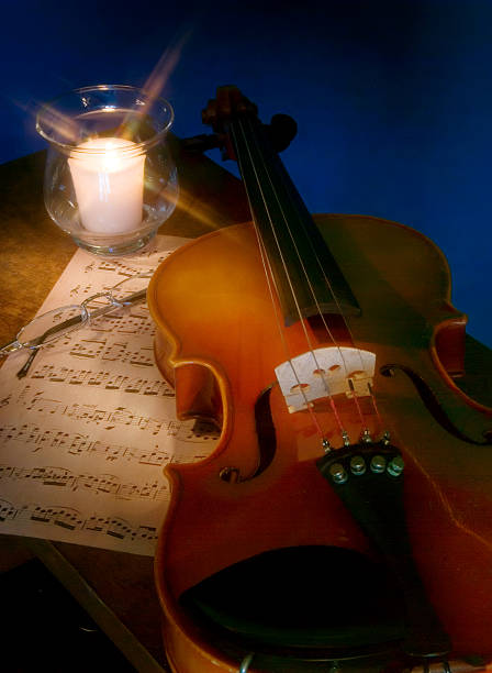 istock Violin, Sheet Music & Candle 172755560