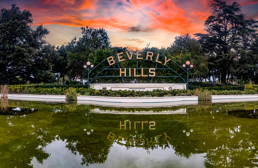 The Beverly Hills Sign under a beautiful reddish sky in the North American city of Los Angeles in the state of California, it is a highly visited place as it is the setting for many movies and series.
