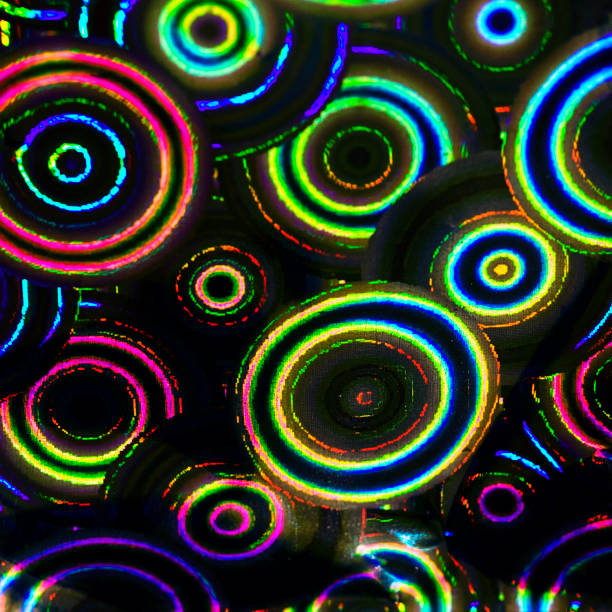 istock Holographic paper seen in psychedelic extreme close-up shot 1727561621