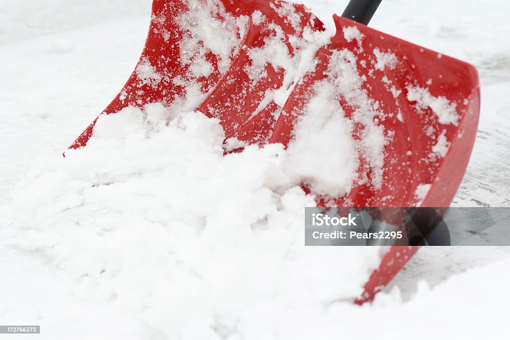 Shoveling 雪 - シャベルのロイヤリティフリーストックフォト