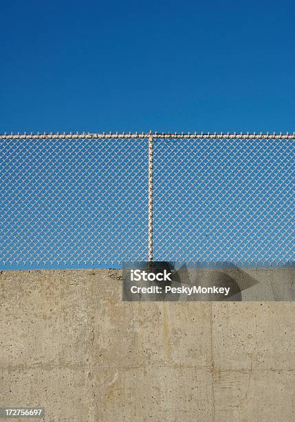 Chain Link Fence And Concrete Wall Stock Photo - Download Image Now - Palestinian, Berlin Wall, Texas