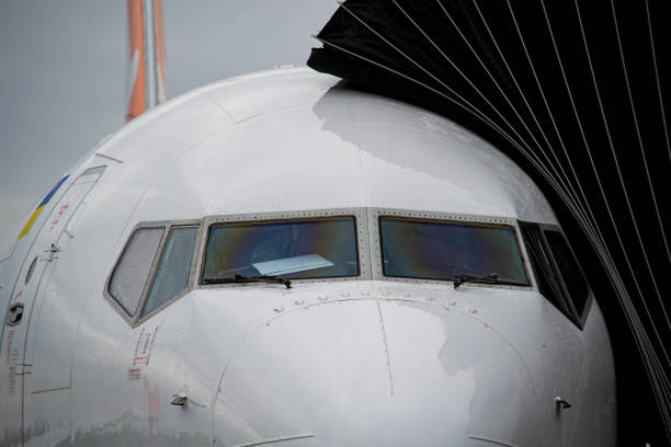 istock Cockpit close-up, connected to airbridge 1727571842
