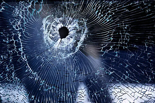 Photo of Bullet Hole in Car Window