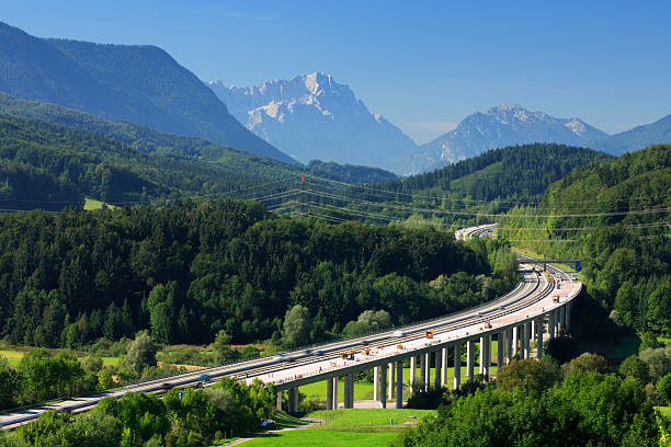 Autobahn through the Bavarian Alps Mount Zugspitze (Germanies highest) in the background autobahn stock pictures, royalty-free photos & images