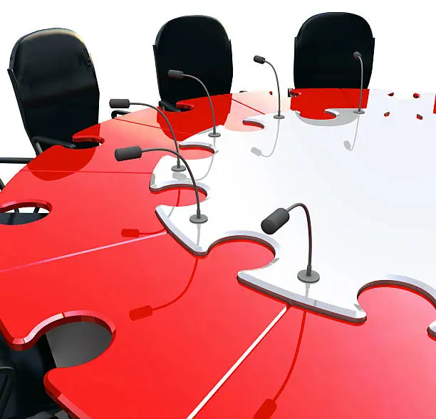 Conceptual conference-table. The table consist of puzzle pieces.