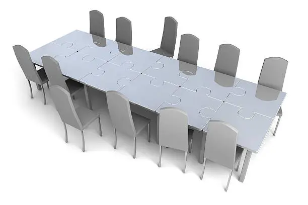 Conceptual big dining-table. The table consist of puzzle pieces.