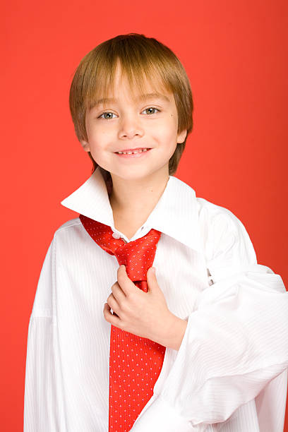 Boy in vintage black suit and tie