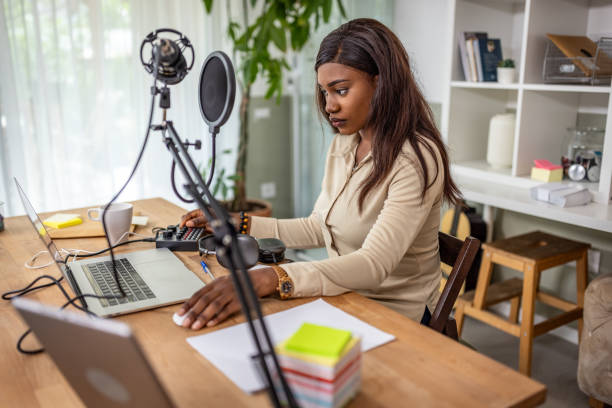 istock Young woman recording podcast 1727580332