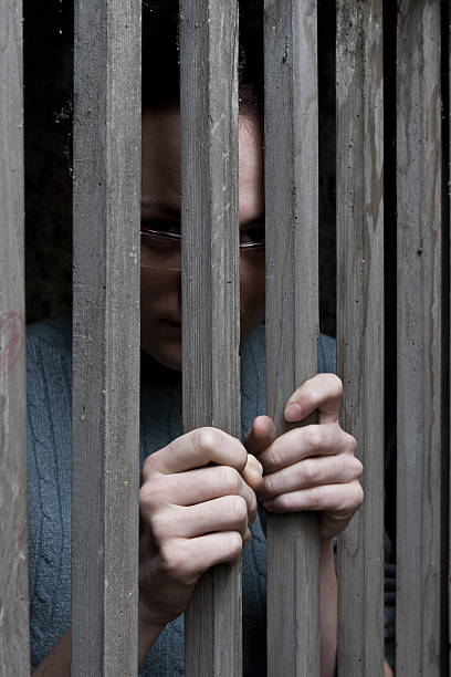 istock woman in cage 172758044