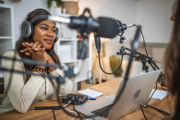 istock Young woman recording podcast 1727581573