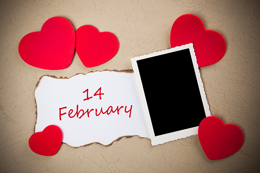 Paper with ,, 14 February'' and hearts