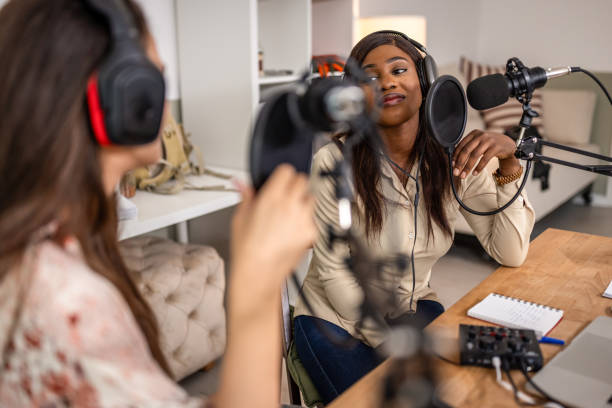 istock Two young women recording podcast 1727590398