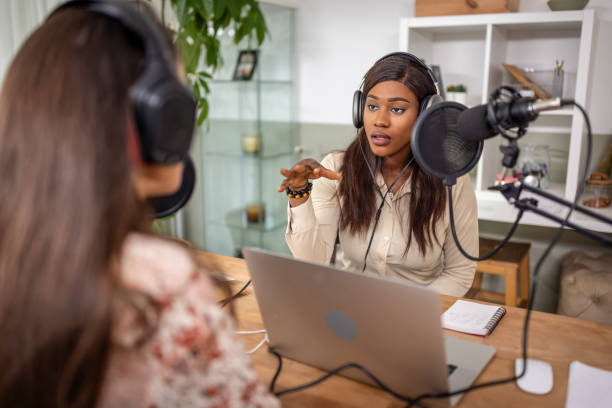 istock Two young women recording podcast 1727590422