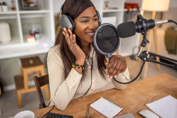 istock Smiling women recording podcast 1727592010