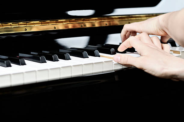 istock playing piano detail 172759261