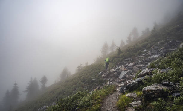 istock Tourists hiking in Alps 1727593664