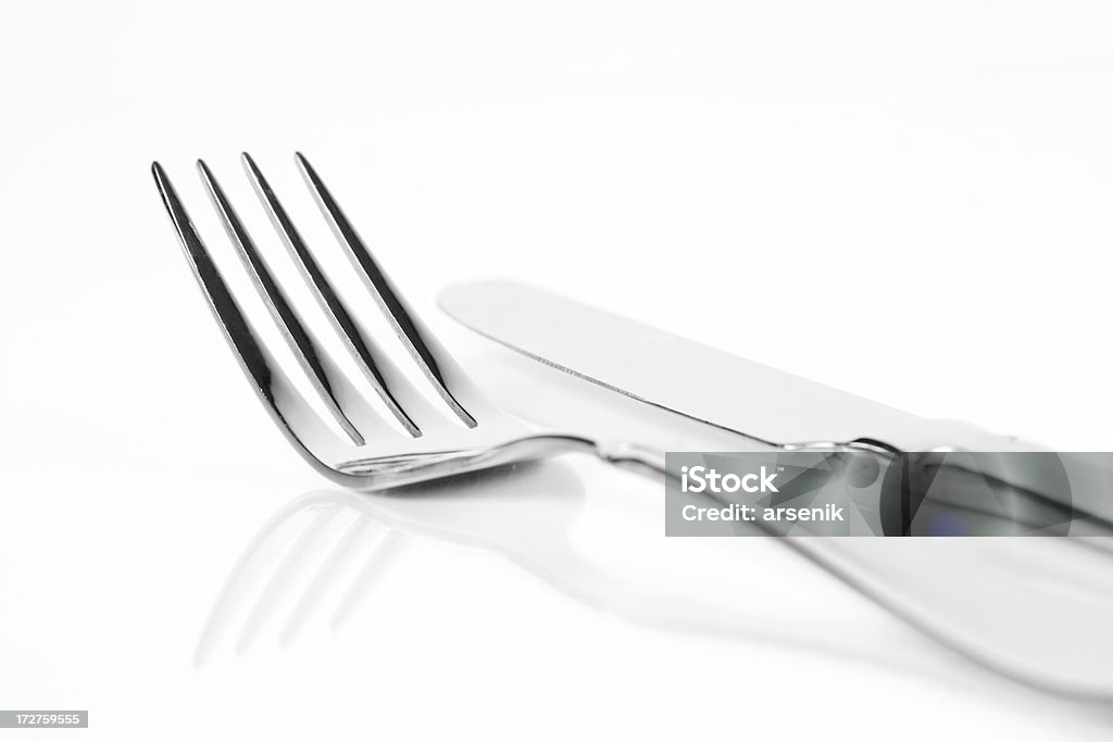 Knife and fork Knife and fork isolated on white background. Bread Knife Stock Photo