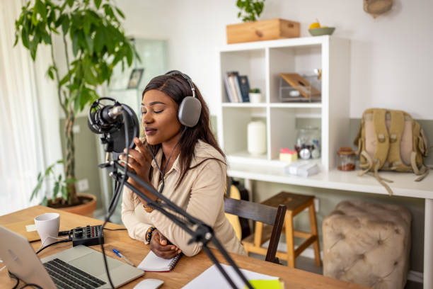 istock Young woman recording podcast 1727597519