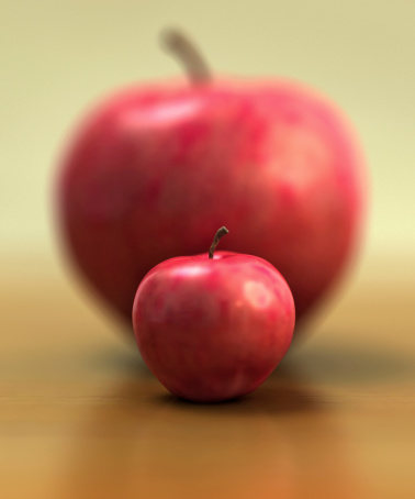 Two apples on a wooden tabletop one big and one small. Focus is on the edge of the smaller apple. Very high resolution 3D render.Also available.
