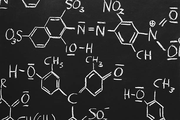 chemical structures on a blackboard chemical structures drawn on a blackboard periodic table photos stock pictures, royalty-free photos & images