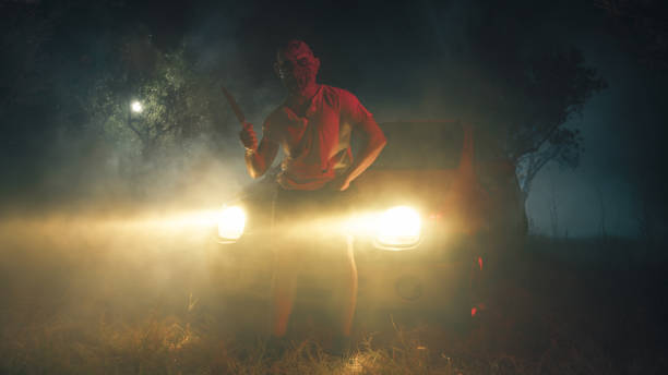 istock Monster plays with knife leaning against the car 1727603507