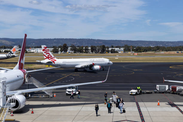 Adelaide, Australia - October 8, 2023: Virgin Australia Boeing 737 taxiing around the airport. Registration VH-VNR
