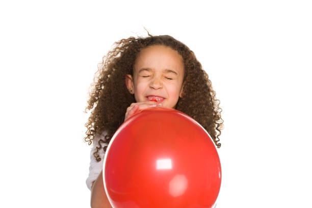 istock red balloon blows out on a little girl 172761685