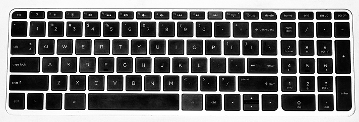 Light keyboard of computer. Top View black Keyboard With Aluminium Isolated With On White Background. PC and laptop concept, computing concept, typing concept.