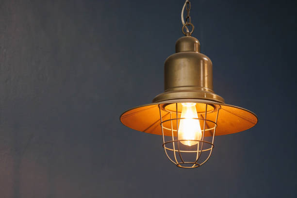 istock vintage bronze hanging lamp with the light bulb. 1727625539