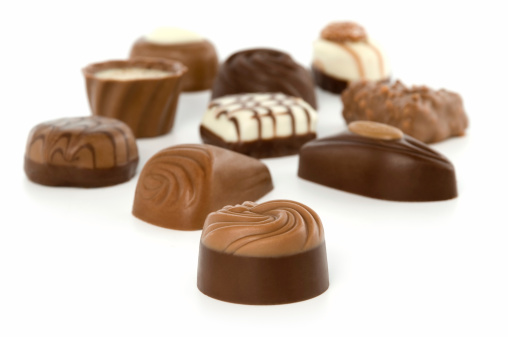 Assorted chocolate candies isolated on white. Related images: