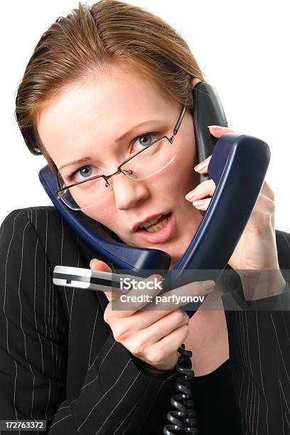 Secretary With Phones Stock Photo - Download Image Now - Adult, Business, Business Person