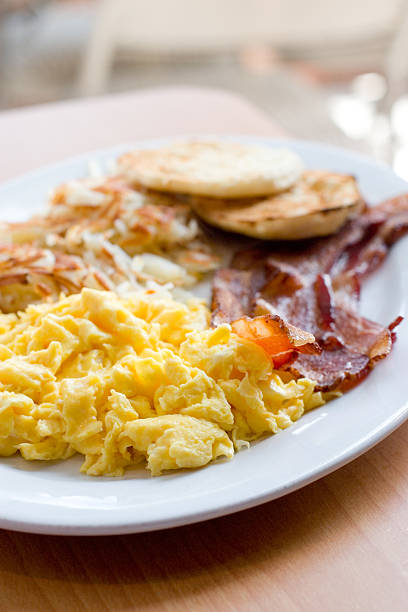 Bacon with Scrambled Eggs, Hash brown Potatoes and Whole Wheat Toast - Photographed on Hasselblad H3D2-39mb Camera